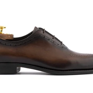 Détails français en cuir et broue