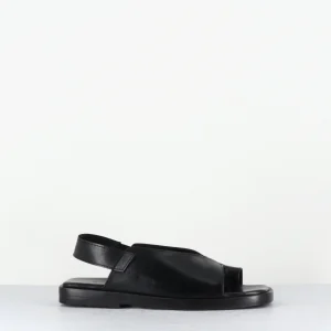 Sandales plates en cuir noir asymétrique - YARA TRILL NERO